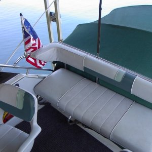 Setee behind helm. Fabric is in excellent shape due to being under covered berth and bimini cover for all its life.