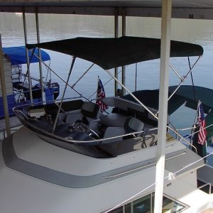 View down into bridge from atop houseboat next door.