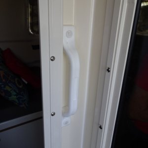 Handles inside of head door.  Makes it easier to get up with one on each side.
