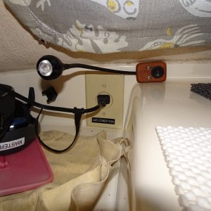 Media 'dedicated plug for window air conditioner (or Ryobi battery charger, and chart light.' in album 'Galley counter and back storage'