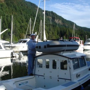Joe placing the dinghy back on the top of R-MATEY