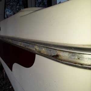 broken and corroded rivets, the rail holds water