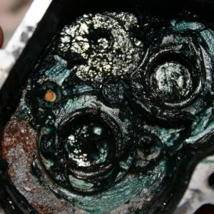 inside of the gear housing looking at the screww holes that allow water in. need to be cleaned and sealed better, bad design.