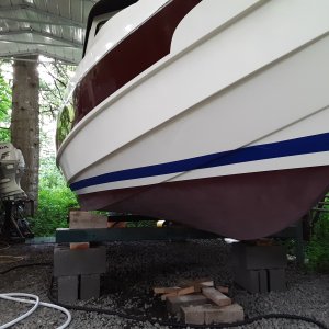 Media 'taping off for the epoxy coats after roughsanding the old bottompaint off (sucked)' in album 'gelcoat on the sheer stripe is badly oxidized'