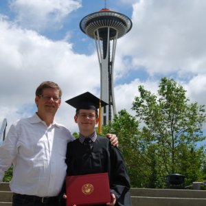 Media 'With his proud father.' in album 'Getting that paper handed to him.'