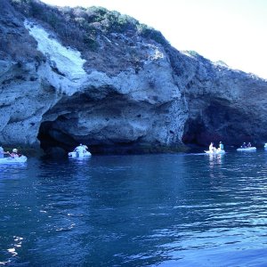 Exploring Caves.  Note oars for seaweed