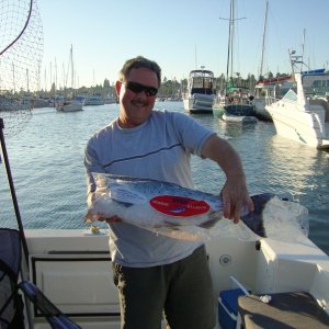 Jeff, a TomCat owner, is very proud of the salmon he caught