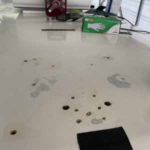 Media 'A few holes to fill & drill' in album 'Covered previous holes with large starboard after filling and redrilling holes and rebedding handrails with 5200 to correct cabin roof leaks'