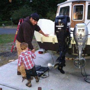 Media 'my son helping me on fathers day work on boat' in album '6 or so hours on pressure waqsher and already looking like a new boat'