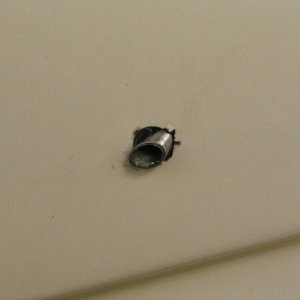 stainless steel tube epoxied into rode locker drain hole