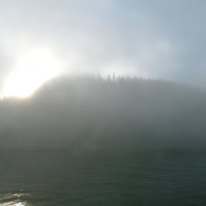 Sun burning off fog at outer entrance to Hoonah.