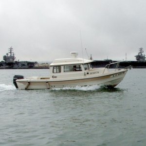 USS Stennis, USS Ronald Reagan, Jenny B with her pants down in San Diego Bay. Photo courtesy of the ever alert Byrdman.