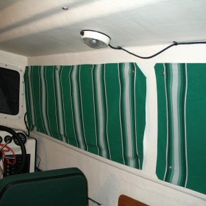 New sunbrella curtains, no sewing required. Used hot glue gun.