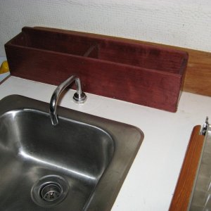 Dish Soap/window cleaner, Misc holder. Made wide enough to hold smaller size dish soap, put divider in center to keep them from moving around. works great.