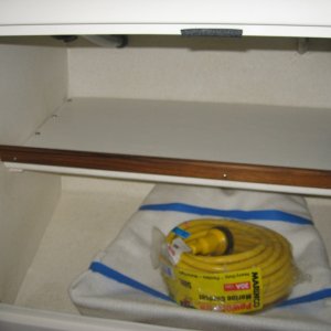 Media 'Underneath Galley' in album '25' Cruiser bow with windlass and drop bow roller'