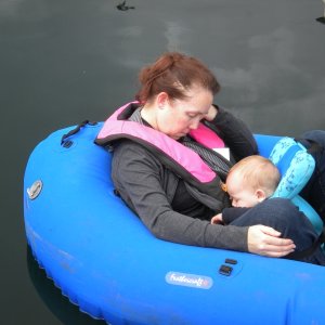 Julia and the newest crew member of  Two Lucky Fish+1 catching a nap.