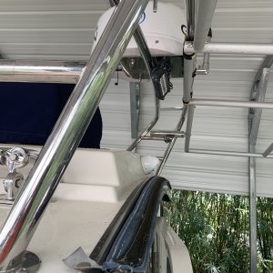 the plan is to have a plastic window on the leading edge secured to the cabin top track zipper
frame attached via Rod Holders with removable pins