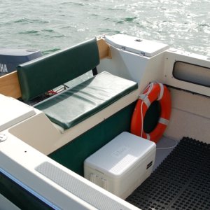 Media '' in album 'Since my crew is a bit shorter than me I put in a step in front of the commuter style seat set up.  It is just a simple step with a flip lid to allow interior storage.  Best thing is that it is attached with only two screws so it is easily removed without leaving damage.'