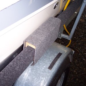 Loading spacer guide over side board, I remove for travel.