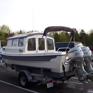 Bimini in the stowed position, also will lay against the cabin if need be.