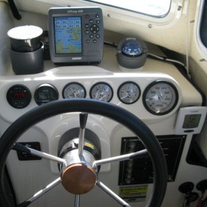 helm - Garmin 498, Ritchie Explorer compass, Xantrex Link 10 house battery monitor, Northstar fuel flow meter, water pressure, volts, trim, tachometer, indoor-outdoor thermometer, Lenco trim tab controller