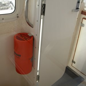 Media 'Flare Kit mounted inside head as viewed from the galley.' in album 'Third (3rd) fire extinguisher added inside cabin, port side.'
