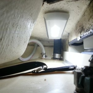 Battery powered lights from Costco to light up tanks and allow for easier level viewing.  I can just reach the switch easy enough and only use them when level checking or fueling up.  Also allowed me to see the black gunk hiding up there and cleaned that up as well.