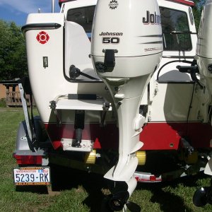 (DaveS)  Who said "you can't have a swim step on a 22' with twin engines?"