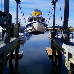 Going back in at Hylebos marina after a fresh coat of bottom paint, new transducer, and some zinc additions to the trim tabs for longer life
