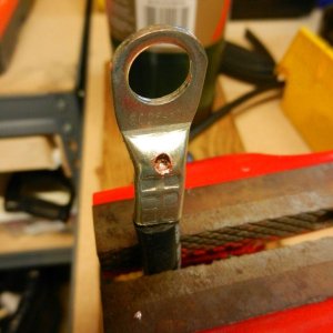 Drill hole in void at tip of wire
