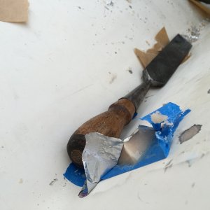 Peeled off the tape on the reservoir, chiseled it flat (I\'m a good chisel guy.  If you aren\'t a good chisel guy maybe use a sanding block)