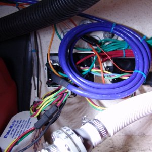 Media 'Electronics and extra wire. Main control module on left, auto tab retractors on right.' in album 'Inside through transom.'