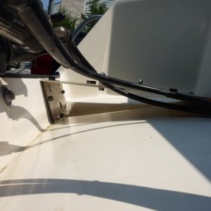 drilled hole on vertical side of plate for drain hole to match up with boats motor well scupper. Getting the correct angle was a pain to get plate to sit level while getting tight to the transom. When the boat is in the water and loaded the plate seems to be parallel with the water