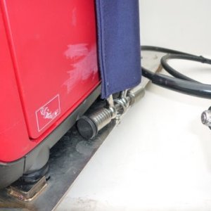 chain with sunbrella covering trailer tonque lock in a bored out shackle thru eye in the plated eye has bolt head welded on the undeneath side of plate.
