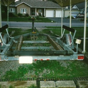 *Drifter's* EZ/loader trailer has a huge stern roller for loading.note that the carpet on the bunks is secured with duct tape...