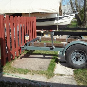 9/5/2011..the roller( white )boat guide on at the rear of the trailer with be in contact with the whole side of the boat when loading/unloading..will mear/remove alot of bottom paint