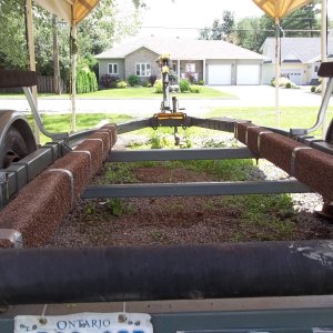 July 11/2011..another picture of my EZ-Loader trailer....i have to watch myself ,the POLICE live in the house in the background