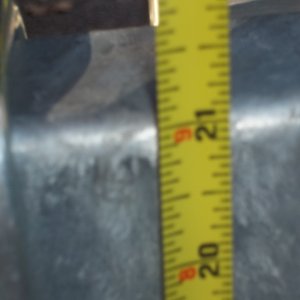 06/10/2011...measured from the top of rear boom just before the taillights to the ground...21 inches
