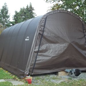 Shelter Logic 24x12x10 . My C-Dory just fits in, way better than my last one.