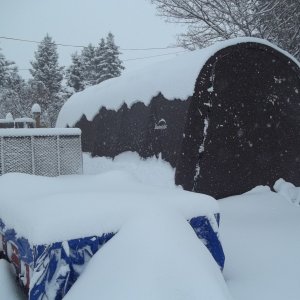 Lots of snow here, my ATV trailer is almost completely covered but my boat is safe and warm.