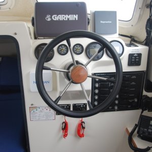 Media 'Sea Angel's helm has some added class
with the new teak hub.' in album 'Wheel Hub replaced with teak hub.'