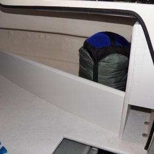 Media 'Storage is an issue, so I used the rest of the Azek board to make a storage cubby in the V berth.  The little cubby next to the helm is dedicated for a first aid kit and ditch bag.' in album 'All of the electrical wiring just hangs loose on the back of the helm, which is in the V berth on the 16.  I've still got a few more modifications (like a negative buss bar) and then I need to cover it up.'