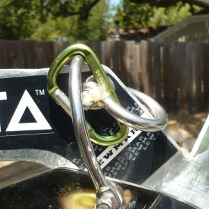 Media 'Safety Trailering clasp closeup. Second shackle can be moved up to the top to secure around the swivel for overnighting.' in album 'Close Fit. New Delta 14 Fast set just clears (old Bruce 11 had plenty of room)as the auto launch drops. Note second shackle at top of anchor allows simple clip to top of roller bar for trailering security. Stainless shackle and SS swivel also just fit in front of windlass even at full tension. Shackle\swivel combo eliminates most of the possibility of side loading on the swivel (I think).'
