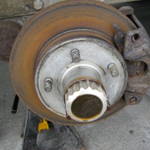 Make sure you have placed a jack stand on each axel.  If your trailer is duel axel only remove one wheel at a time, this provides a higher level of safety.