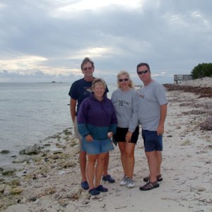 The crews of Discovery and Wild Blue on the beach