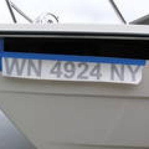 Media 'Same for the reg numbers. Measure, step back, eye-ball it, mearure again.  The reg numbers were much easier though, due to the black line in the gel coat as a guide.' in album 'Boat name applied.  'Au Kai means "Ocean Traveler".'