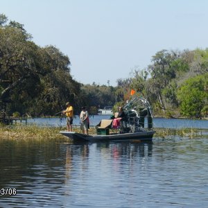 Airboat with guys Bow Hunting on it for fish ! Cool..