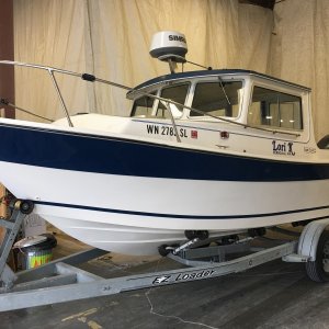 A re-done 1984 SeaSport 22 waiting at the entrance