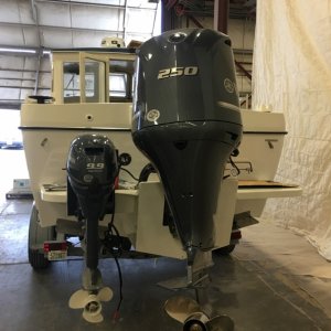 1984 refitted w/ Outboard bracket and kicker. Originally these were I/O boats.