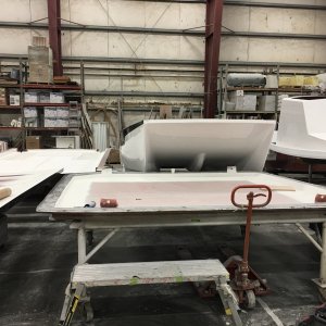 Another Tom Cat hull and deck/cabin over there prior to joining